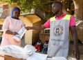 Uganda receives 1st batch of presidential ballot papers for Jan. 14 polls.
