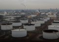 Oil prices edge up on strong China data, U.S. crude oil draw
