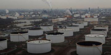 Oil prices edge up on strong China data, U.S. crude oil draw