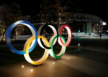 Japan PM Vows to Press on with Olympics Despite Virus Surge