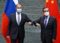 Rejecting criticism, Chinese and Russians meet in show of unity