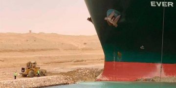 Dislodging Suez Canal ship could take at least a week
