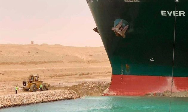 Dislodging Suez Canal ship could take at least a week
