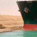 Dislodging Suez Canal ship could take at least a week
