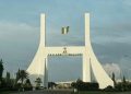 BREAKING: Pro-Buhari protesters fight while sharing money in Abuja