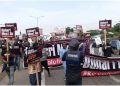 Police clash with protesters in Abuja