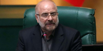 Top Iranian politician sues newspaper cartoonist over own caricature