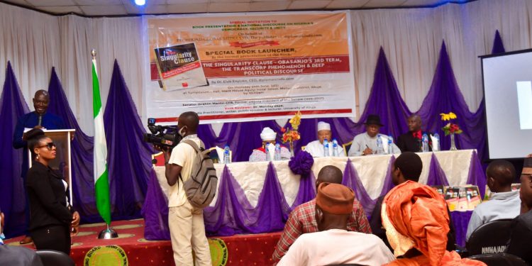 THE BOOK: THE SINGULARITY CLAUSE – OBASANJO’S 3RD TERM, THE TRANSCORP PHENOMENON & DEEP POLITICAL DISCOURSE, BY DR. ELVIS ENYIOKO, PUBLICLY PRESENTED WITH ASTONISHING REVIEW