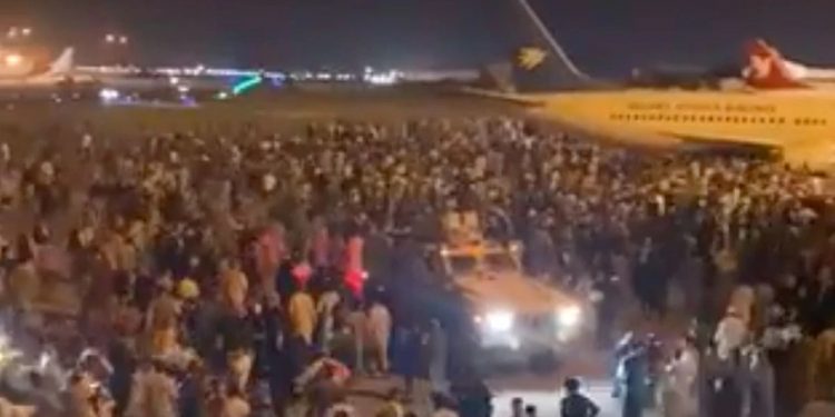 Five killed at Kabul airport as Taliban proclaims peace