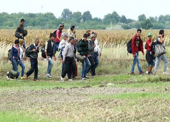 Latvia pushes back as Belarus sends migrants across border