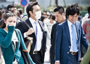 To enforce quarantine, Japan to name, shame those violating rules