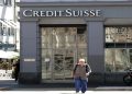 As investigation begins, Swiss police raid Credit Suisse offices