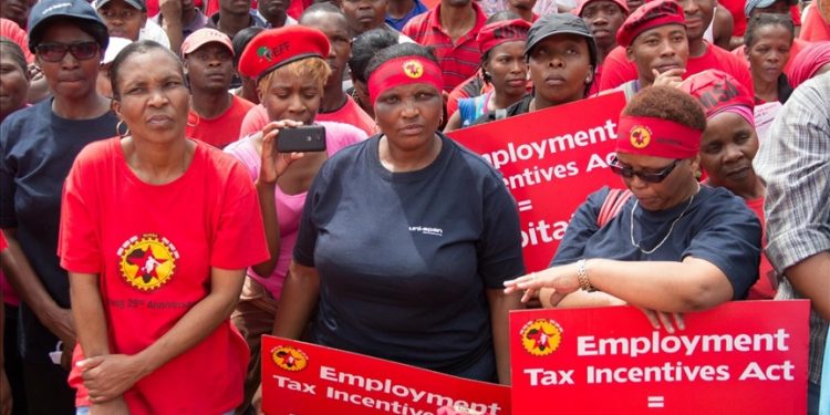 Workers march across South Africa over job losses, corruption