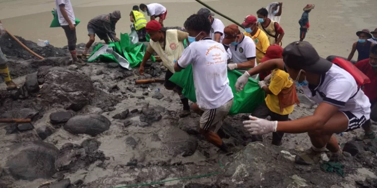 One dead, dozens missing after landslide at Myanmar jade mine