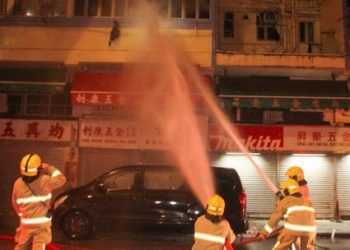 Hundreds rescued after fire breaks out in Hong Kong high-rise