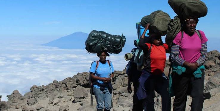 Low paid porters of Africa’s Mount Kilimanjaro demand better wages