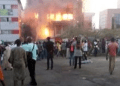 Mob burns vehicles, shops in Wuse after correctional officers kill convict on way to prison