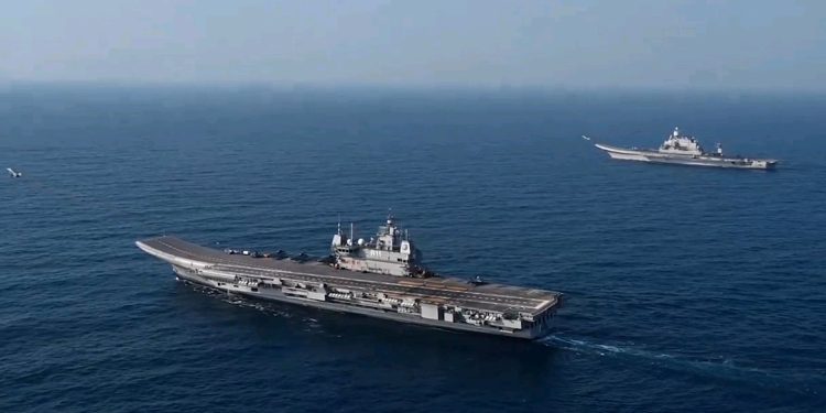 America’s New Partner Against China Shows Off Aircraft Carriers