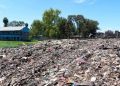 Kenyan students plant bamboo to help offset huge trash dump next door