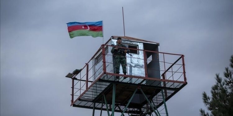 Azerbaijan says military positions near Armenian border came under fire