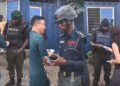 AKH-TRACADA demands probe of video showing Chinese national giving cash to policemen