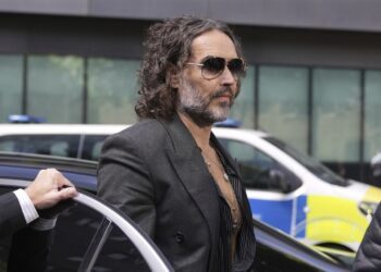 Comedian Russell Brand pleads not guilty to rape, sexual assault