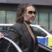 Comedian Russell Brand pleads not guilty to rape, sexual assault