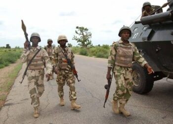 Troops arrest four suspected armed robbers, recover weapons in Jos