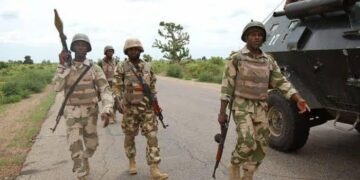 Troops arrest four suspected armed robbers, recover weapons in Jos