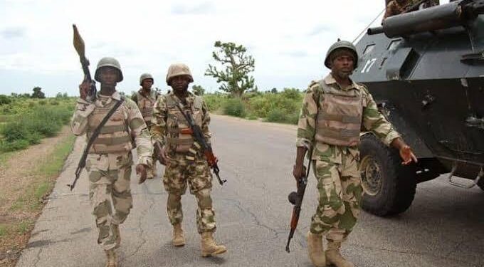 Troops arrest four suspected armed robbers, recover weapons in Jos