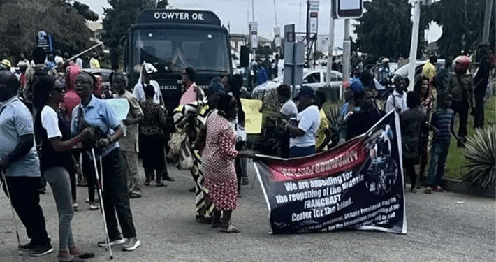 Minister meets with protesting visually impaired persons