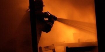 Suspected protesters set government building on fire in South Africa