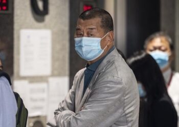 Hong Kong publisher Jimmy Lai sentenced to 20 years in prison