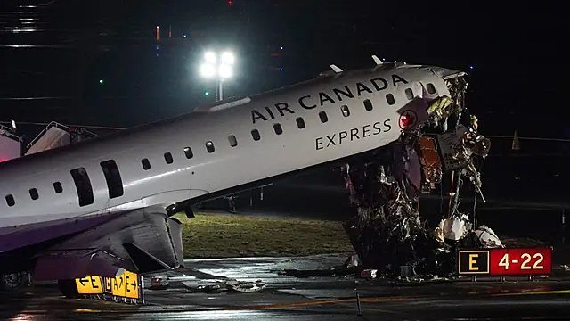 Two killed as plane collides with vehicle, LaGuardia airport shut down