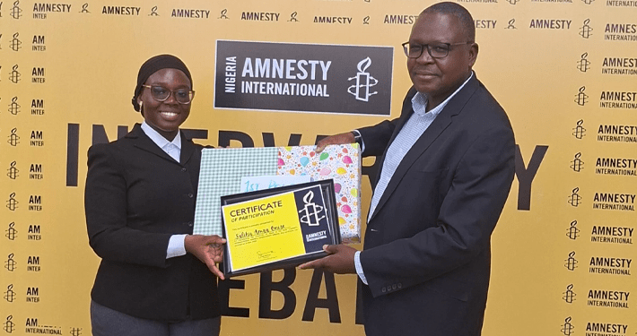 UniAbuja student wins Amnesty International’s 2026 inter-varsity debate