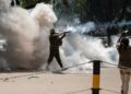 Police use teargas to disperse anti-France protesters near Nairobi summit
