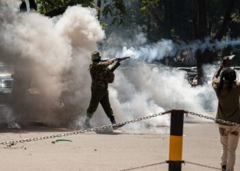 Police use teargas to disperse anti-France protesters near Nairobi summit