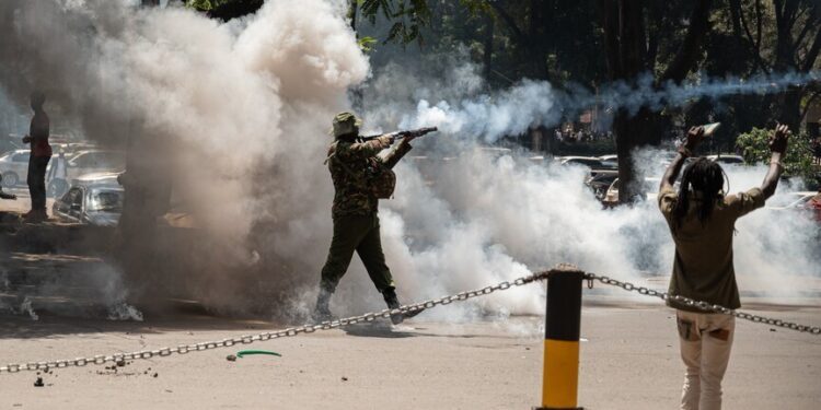 Police use teargas to disperse anti-France protesters near Nairobi summit