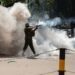 Police use teargas to disperse anti-France protesters near Nairobi summit