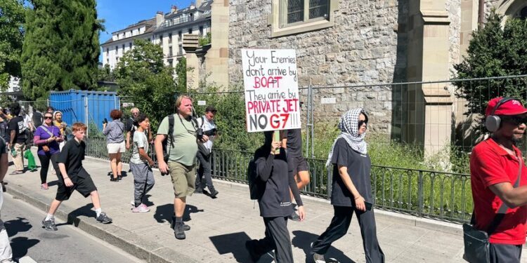 Thousands join anti-G7 march in Geneva under heavy security