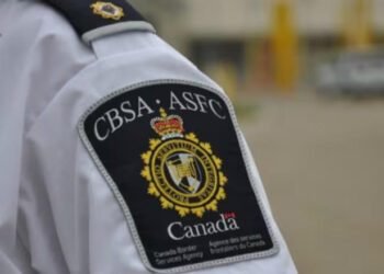 Canadian authorities charged two men for defrauding international students $126,000; hunt fleeing suspect