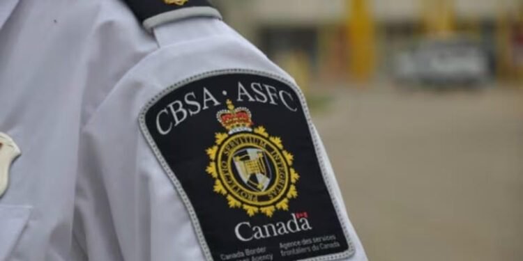 Canadian authorities charged two men for defrauding international students $126,000; hunt fleeing suspect