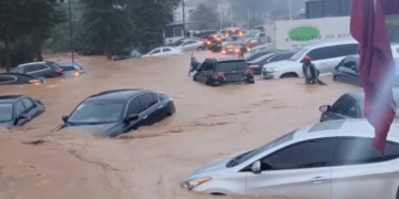Nigeria’s capital city Abuja flooded, vehicles submerged as FCT residents accuse Wike of encroaching on green areas