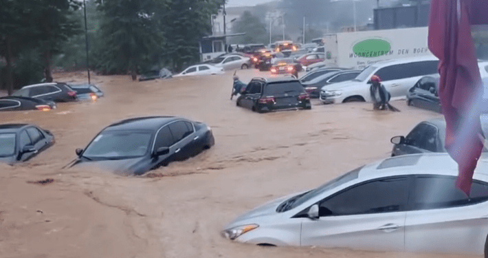 Nigeria’s capital city Abuja flooded, vehicles submerged as FCT residents accuse Wike of encroaching on green areas