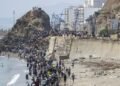 Morocco says 11 died during attempted crossing by 40,000 people to Spain’s Ceuta