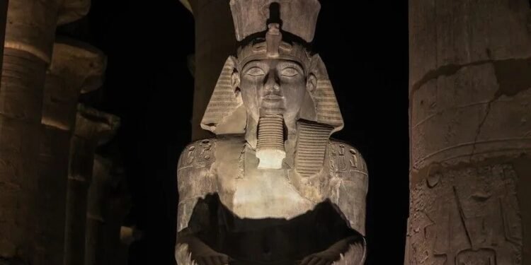 Egyptian villager’s chance discovery leads archaeologists to colossal statue head of Ramses II